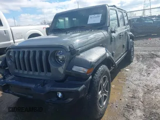 2020 Jeep Wrangler Unlimited Sport Altitude with VIN 1C4HJXDG2LW335228, listed as a IAAI auction lot 41711295 with 43,451 mi miles and . Bid and sale history available at DreamBid. Image 2.