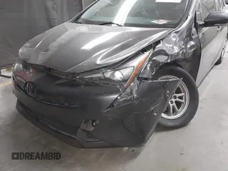 2018 Toyota Prius Two with VIN JTDKARFU6J3553871, listed as a IAAI auction lot 41577636 with 118,715 mi miles. Bid and sale history available at carsss.com. Image 6.