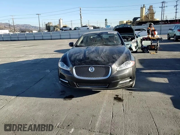 2013 Jaguar XJ with VIN SAJWA2GB0DLV43865, listed as a Copart auction lot 79693934 with 0 mi miles and Salvage Title. Bid and sale history available at carsss.com. Image 10.