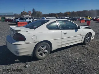 2002 Pontiac Grand Am GT with VIN 1G2NW12E22C203836, listed as a Copart auction lot 77662194 with 182,635 mi miles and Salvage Title. Bid and sale history available at carsss.com. Image 3.
