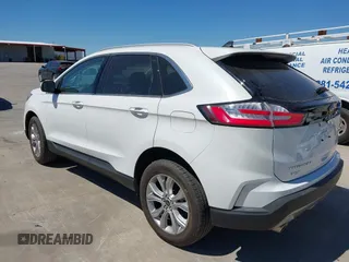 2024 Ford Edge Titanium z VIN 2FMPK4K98RBA75080, wystawiony jako IAAI lot #41843758 z przebiegiem 8687 mil mil oraz . Historia ofert i sprzedaży dostępna na DreamBid. Obrazek 3.