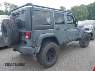 2015 Jeep Wrangler Unlimited Sport with VIN 1C4HJWDG1FL635620, listed as a IAAI auction lot 42396137 with 87,352 mi miles and . Bid and sale history available at DreamBid. Image 4.