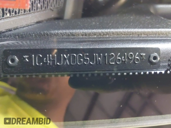 2018 Jeep Wrangler Unlimited Sport S with VIN 1C4HJXDG5JW126496, listed as a IAAI auction lot 42390584 with 163,476 mi miles and . Bid and sale history available at DreamBid. Image 18.