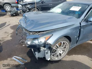 2015 Infiniti Q50 Premium with VIN JN1BV7AR7FM408550, listed as a IAAI auction lot 41619558 with 137,678 mi miles. Bid and sale history available at carsss.com. Image 6.