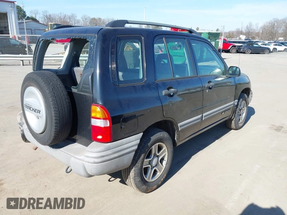 2003 Chevrolet Tracker with VIN 2CNBE13C736921273, listed as a IAAI auction lot 41453815 with 150,768 mi miles and . Bid and sale history available at DreamBid. Image 4.