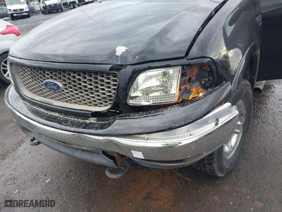 2000 Ford F-150 XL with VIN 1FTRX18W9YNA63551, listed as a IAAI auction lot 41446703 with 1 mi miles. Bid and sale history available at carsss.com. Image 6.