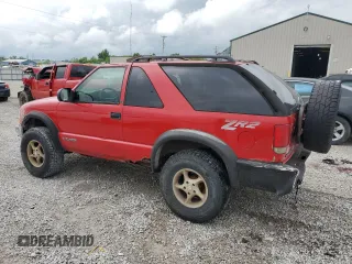 1999 Chevrolet Blazer LS с VIN 1GNCT18W3XK150385, выставлен на аукционе Copart как лот 58490985 с пробегом 262 007 миль миль и Списание • Salvage title. История ставок и продаж доступна на DreamBid. Изображение 2.