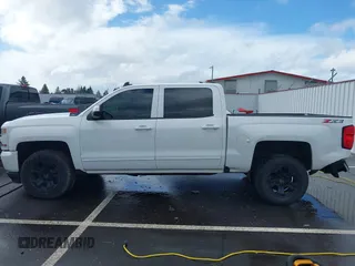 2018 Chevrolet Silverado 1500 LT with VIN 3GCUKREC5JG595959, listed as a IAAI auction lot 41608507 with 117,824 mi miles. Bid and sale history available at carsss.com. Image 14.