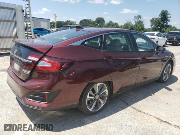 2018 Honda Clarity Touring with VIN JHMZC5F34JC006234, listed as a Copart auction lot 65652714 with 63,704 mi miles and Salvage Title. Bid and sale history available at DreamBid. Image 3.