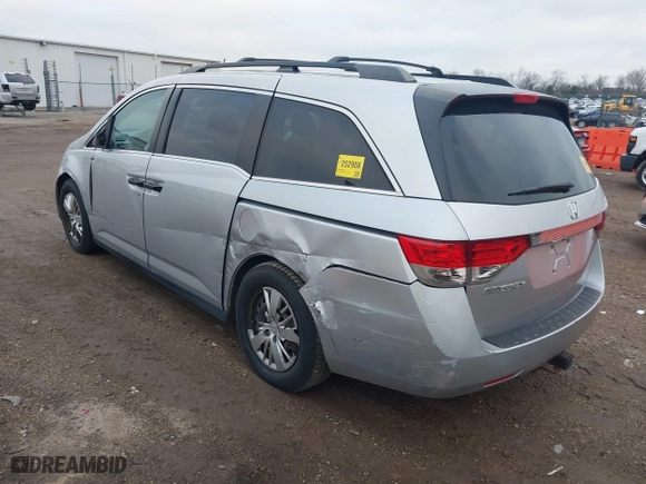 2014 Honda Odyssey LX with VIN 5FNRL5H22EB026657, listed as a IAAI auction lot 41114634 with 132,125 mi miles. Bid and sale history available at carsss.com. Image 3.