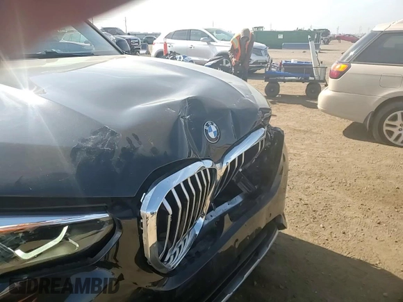 2020 BMW X5 xDrive40i with VIN 5UXCR6C08LLL83222, listed as a Copart auction lot 58377955 with 38,854 mi miles and Salvage title. Bid and sale history available at DreamBid. Image 14.