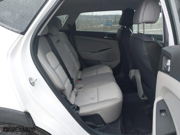 2016 Hyundai Tucson SE with VIN KM8J3CA40GU145648, listed as a IAAI auction lot 41951378 with 115,486 mi miles. Bid and sale history available at carsss.com. Image 8.