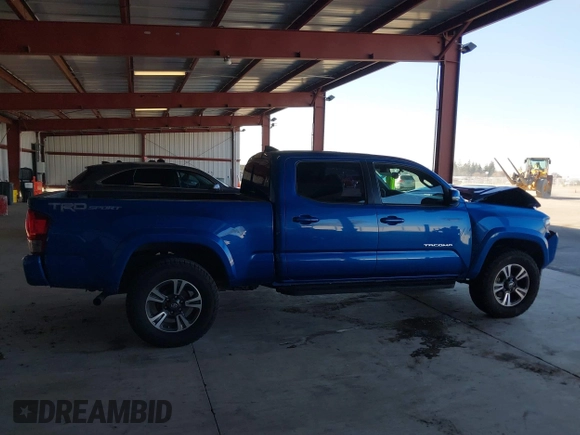 2017 Toyota Tacoma SR5 with VIN 3TMBZ5DN1HM009204, listed as a IAAI auction lot 41301765 with 129,923 mi miles and . Bid and sale history available at DreamBid. Image 13.