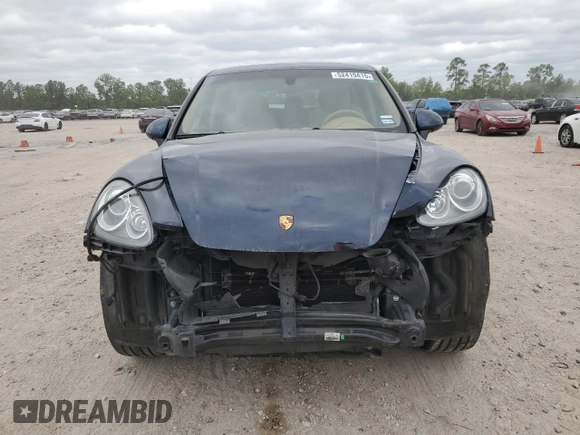 2011 Porsche Cayenne с VIN WP1AA2A20BLA01257, выставлен на аукционе Copart как лот 52419415 с пробегом 171 861 миль миль и Списание • Salvage title. История ставок и продаж доступна на DreamBid. Изображение 5.