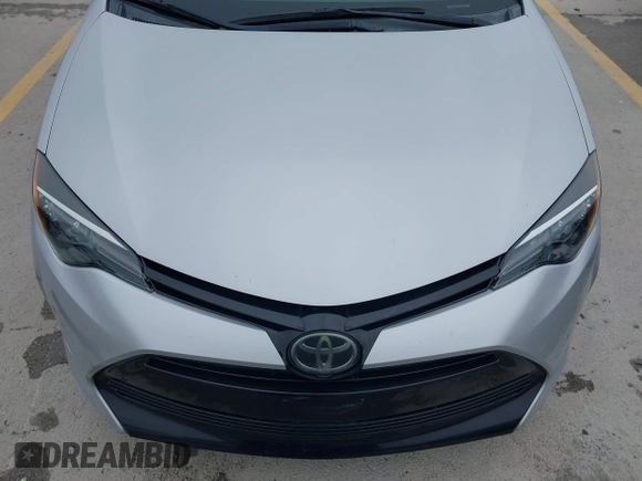 2018 Toyota Corolla L z VIN 5YFBURHE7JP822870, wystawiony jako IAAI lot #42318344 z przebiegiem 118 519 mil mil oraz . Historia ofert i sprzedaży dostępna na DreamBid. Obrazek 6.
