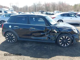 2017 MINI Hardtop 4 Door Cooper S z VIN WMWXU3C39H2F48699, wystawiony jako IAAI lot #41924423 z przebiegiem 81 249 mil mil oraz . Historia ofert i sprzedaży dostępna na DreamBid. Obrazek 17.