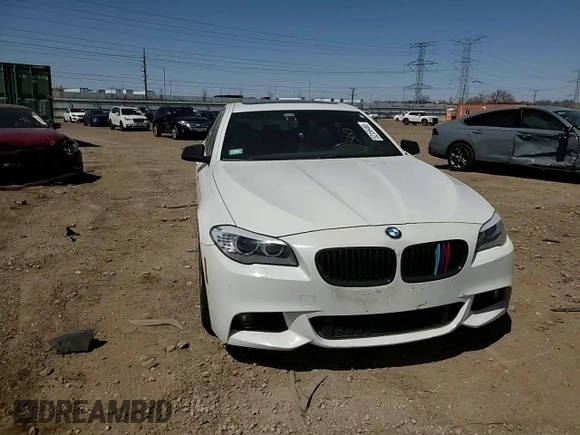 2013 BMW 5 Series 550i xDrive with VIN WBAFU9C52DDY71651, listed as a Copart auction lot 52156465 with 144,211 mi miles and Salvage title. Bid and sale history available at DreamBid. Image 11.