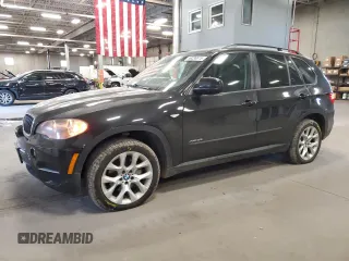 2011 BMW X5 35i z VIN 5UXZV4C52BL743475, wystawiony jako Copart lot #56238615 z przebiegiem 218 738 mil mil oraz Szkoda całkowita • Salvage title. Historia ofert i sprzedaży dostępna na DreamBid. Obrazek 1.