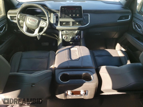 2022 GMC Yukon SLT with VIN 1GKS2BKD5NR356479, listed as a Copart auction lot 77674304 with 33,580 mi miles and Salvage Title. Bid and sale history available at carsss.com. Image 8.