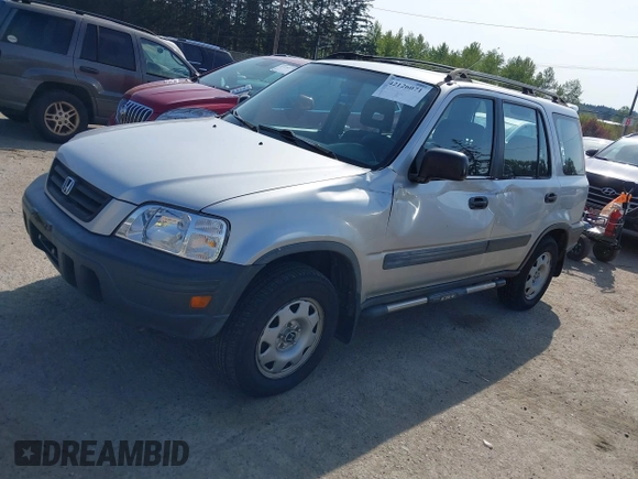 1999 Honda CR-V LX with VIN JHLRD1840XC057285, listed as a IAAI auction lot 42126071 with 99,000 mi miles. Bid and sale history available at carsss.com. Image 2.