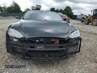 2014 Tesla Model S 60 with VIN 5YJSA1H11EFP65266, listed as a Copart auction lot 60934805 with 93,546 mi miles and Salvage title. Bid and sale history available at DreamBid. Image 5.
