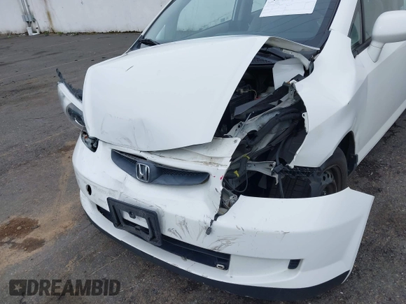 2007 Honda Fit z VIN JHMGD38447S048996, wystawiony jako IAAI lot #41928529 z przebiegiem 77 381 mil mil oraz . Historia ofert i sprzedaży dostępna na DreamBid. Obrazek 6.