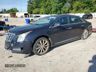 2013 Cadillac XTS Luxury z VIN 2G61P5S31D9171181, wystawiony jako Copart lot #57567205 z przebiegiem Nie podano mil oraz Tytuł czysty. Historia ofert i sprzedaży dostępna na DreamBid. Obrazek 1.