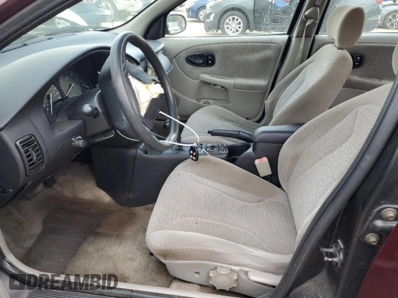 2001 Saturn SL with VIN 1G8ZK54761Z320887, listed as a Copart auction lot 54170885 with 99,265 mi miles and Salvage title. Bid and sale history available at DreamBid. Image 7.