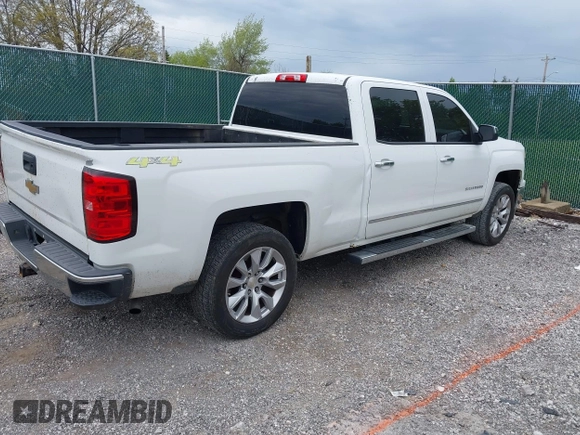 2014 Chevrolet Silverado 1500 LTZ with VIN 3GCUKSEC8EG201285, listed as a IAAI auction lot 41995932 with 128,071 mi miles. Bid and sale history available at carsss.com. Image 4.