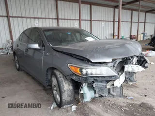 2014 Acura RLX with VIN JH4KC1F32EC001470, listed as a IAAI auction lot 41599367 with 166,438 mi miles. Bid and sale history available at carsss.com. Image 1.