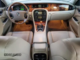 2004 Jaguar XJ with VIN SAJWA71C14SG16264, listed as a Copart auction lot 83251554 with 267,493 mi miles and Salvage Title. Bid and sale history available at carsss.com. Image 8.
