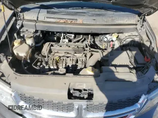 2016 Dodge Journey SE with VIN 3C4PDCABXGT103296, listed as a Copart auction lot 56358715 with 106,821 mi miles and Clean Title. Bid and sale history available at DreamBid. Image 12.