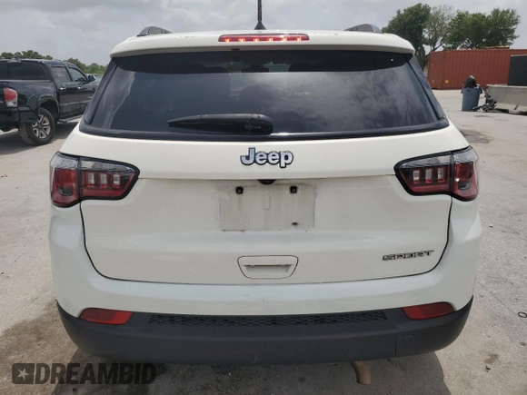 2018 Jeep Compass Sport with VIN 3C4NJCAB1JT461958, listed as a Copart auction lot 59567105 with 181,632 mi miles and Salvage title. Bid and sale history available at DreamBid. Image 6.