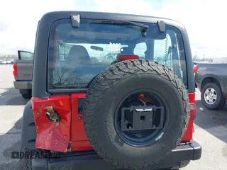 2002 Jeep Wrangler X with VIN 1J4FA39S02P739211, listed as a IAAI auction lot 41665910 with 144,118 mi miles. Bid and sale history available at carsss.com. Image 8.