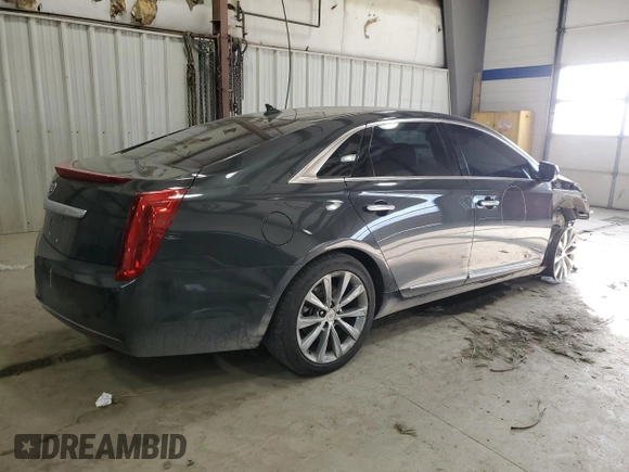 2014 Cadillac XTS with VIN 2G61L5S30E9159696, listed as a Copart auction lot 87954675 with 31,920 mi miles and Salvage Title. Bid and sale history available at carsss.com. Image 3.