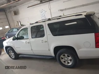 2013 GMC Yukon XL SLT with VIN 1GKS2KE70DR273126, listed as a IAAI auction lot 42147902 with 233,032 mi miles. Bid and sale history available at carsss.com. Image 14.
