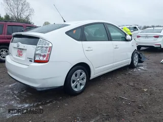 2007 Toyota Prius with VIN JTDKB20U373294200, listed as a IAAI auction lot 41990060 with 117,924 mi miles. Bid and sale history available at carsss.com. Image 4.