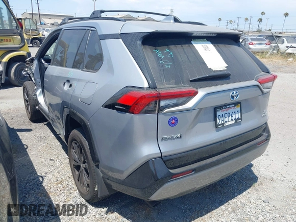 2022 Toyota RAV4 Hybrid SE z VIN 4T3T6RFV9NU070229, wystawiony jako IAAI lot #42565070 z przebiegiem 21 901 mil mil oraz . Historia ofert i sprzedaży dostępna na DreamBid. Obrazek 3.
