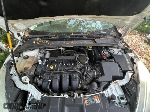 2015 Ford Focus SE with VIN 1FADP3F21FL338821, listed as a Copart auction lot 62089035 with 84,648 mi miles and Salvage title. Bid and sale history available at DreamBid. Image 7.