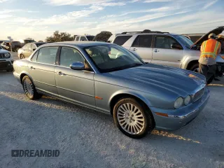 2005 Jaguar XJ VDP with VIN SAJWA82C65SG45247, listed as a Copart auction lot 77950594 with 0 mi miles and Salvage Title. Bid and sale history available at carsss.com. Image 4.