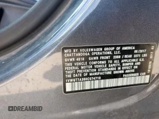 2017 Volkswagen Passat SE z VIN 1VWGT7A35HC074710, wystawiony jako Copart lot #57789935 z przebiegiem 117 351 mil mil oraz Szkoda całkowita • Salvage title. Historia ofert i sprzedaży dostępna na DreamBid. Obrazek 12.