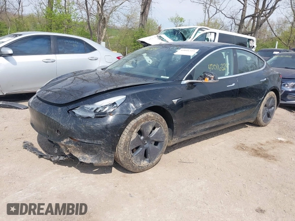 2018 Tesla Model 3 Long Range Battery z VIN 5YJ3E1EB2JF103096, wystawiony jako IAAI lot #42016324 z przebiegiem 143 247 mil mil oraz . Historia ofert i sprzedaży dostępna na DreamBid. Obrazek 2.