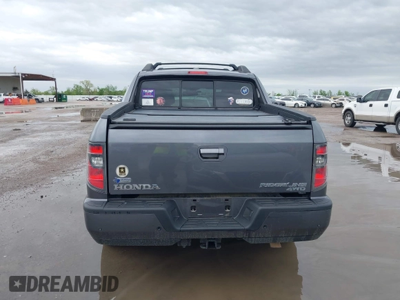 2014 Honda Ridgeline RTL with VIN 5FPYK1F50EB002577, listed as a IAAI auction lot 41931258 with 147,665 mi miles. Bid and sale history available at carsss.com. Image 16.