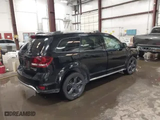 2019 Dodge Journey Crossroad with VIN 3C4PDCGG4KT857726, listed as a IAAI auction lot 41871156 with 96,953 mi miles. Bid and sale history available at carsss.com. Image 4.