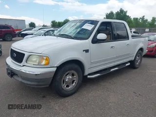 2003 Ford F-150 XLT with VIN 1FTRW07603KC13314, listed as a IAAI auction lot 42684852 with 135,849 mi miles and . Bid and sale history available at DreamBid. Image 2.