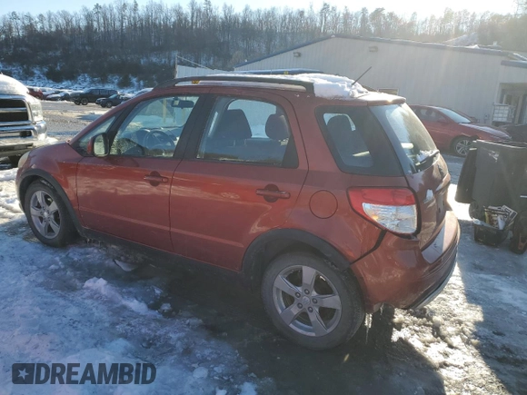2011 Suzuki SX4 Crossover with VIN JS2YB5A38B6304623, listed as a Copart auction lot 88480495 with 92,369 mi miles and Salvage Title. Bid and sale history available at carsss.com. Image 2.
