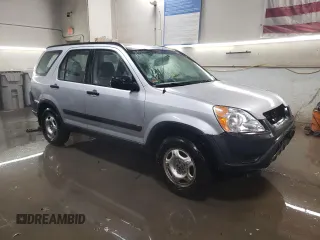 2002 Honda CR-V LX with VIN JHLRD68512C009941, listed as a Copart auction lot 87699075 with 133,311 mi miles and Salvage Title. Bid and sale history available at DreamBid. Image 4.