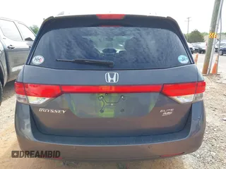 2015 Honda Odyssey Touring Elite z VIN 5FNRL5H97FB060981, wystawiony jako IAAI lot #42289631 z przebiegiem 160 947 mil mil oraz . Historia ofert i sprzedaży dostępna na DreamBid. Obrazek 16.
