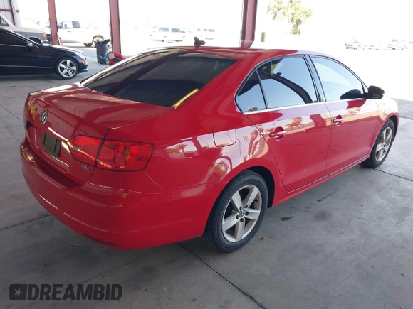 2013 Volkswagen Jetta TDI w/Premium with VIN 3VW3L7AJ2DM246343, listed as a IAAI auction lot 42157433 with 140,955 mi miles and . Bid and sale history available at DreamBid. Image 4.