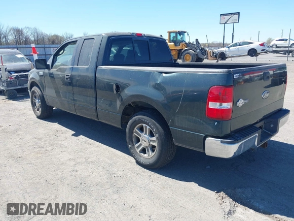 2005 Ford F-150 XLT with VIN 1FTPX12585FA60086, listed as a IAAI auction lot 41859864 with 115,448 mi miles. Bid and sale history available at carsss.com. Image 3.